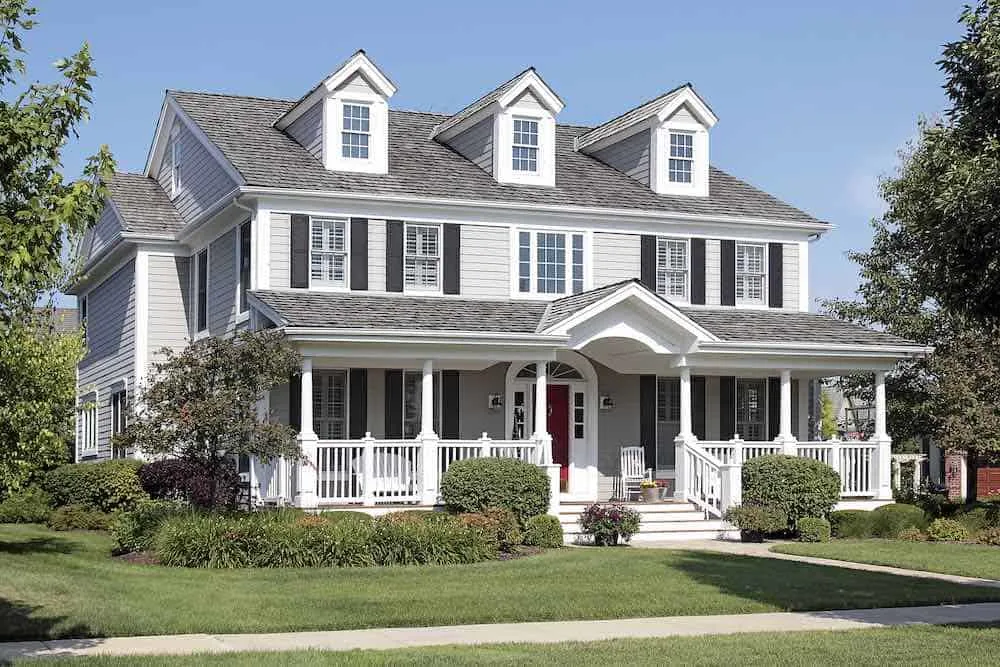 Tan house black shutters