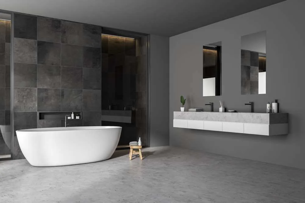 22 Inspiring Bathroom Paint Colors 13 A glossy contemporary bathroom with gray wall, gray tiling, and gray stone floor.