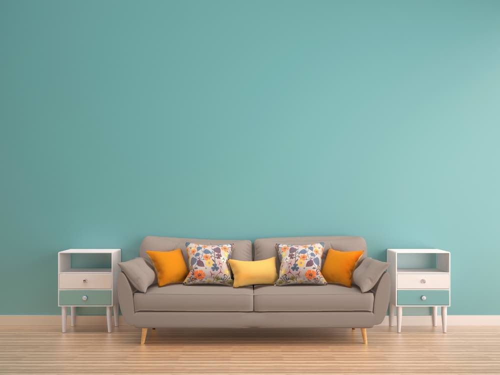 Channel summer skies with turquoise, one of the best living room paint colors we've ever seen. 