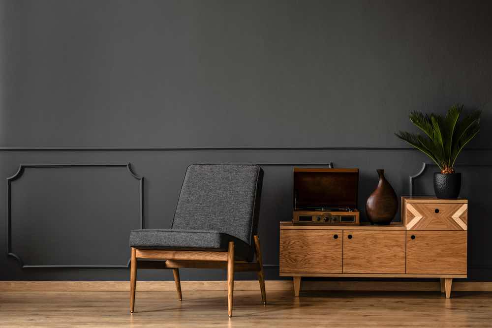 Create the midcentury modern home of your dream with a rich warm gray living room paint color. 