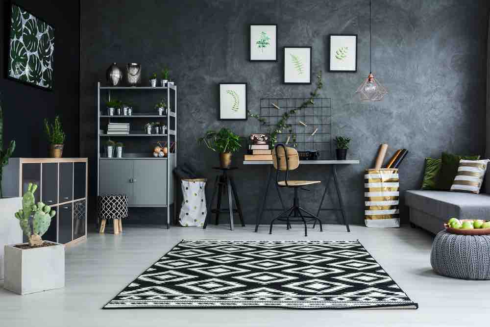 Gunmetal gray doesn't have to be cold and off-putting, it's adaptability makes it one of the best living room paint colors. 