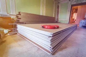 panels of drywall sitting in a room
