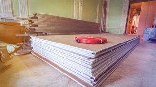 panels of drywall sitting in a room