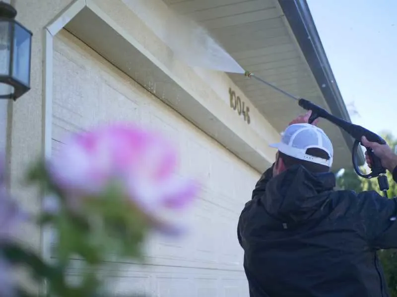 How To Paint Stucco: A DIY Guide 5 Pressure washing stucco before painting