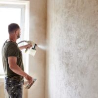 how to paint a house with a sprayer