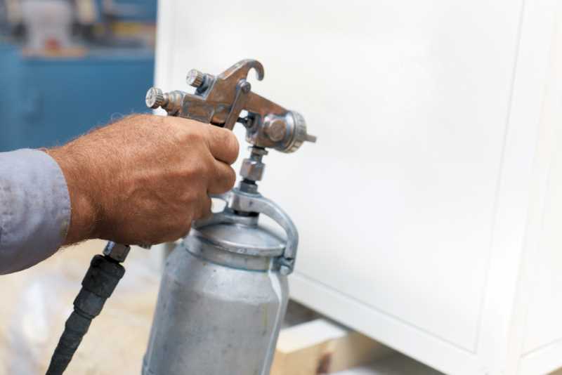 Painting cabinets with a paint sprayer