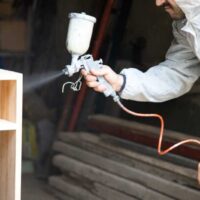 Using the best paint sprayer for furniture to paint a desk