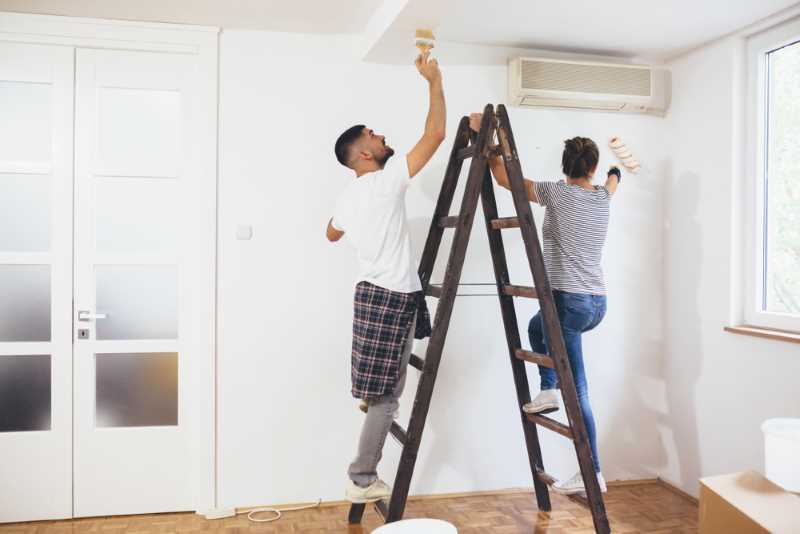 The Best One Coat Interior Paint: Choose from These 8 Top Options 3 Using the best one oat interior paint to paint an interior room