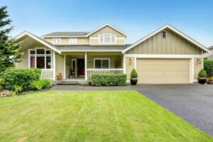 A house painted with multiple green exterior paint colors