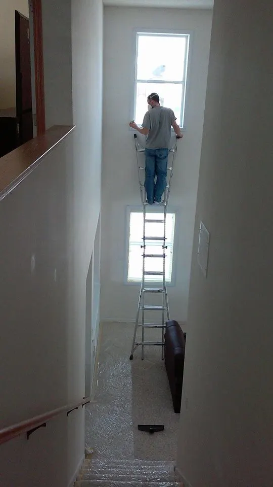 Ryan painting high walls