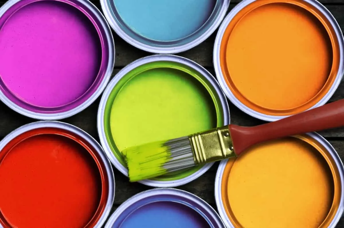 Cans of paint in various colors.
