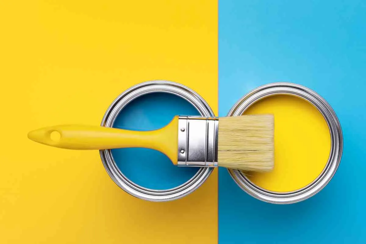 blue and yellow paint cans with paint brush indicating satin vs semi gloss sheens