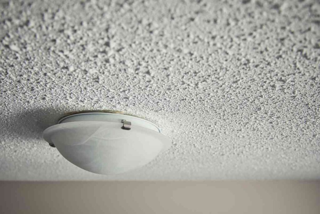 Textured ceiling with a light
