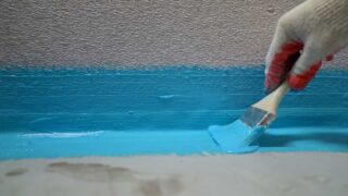 Painting concrete and stucco blue.