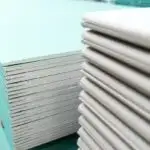 Stacks of drywall in different thicknesses.