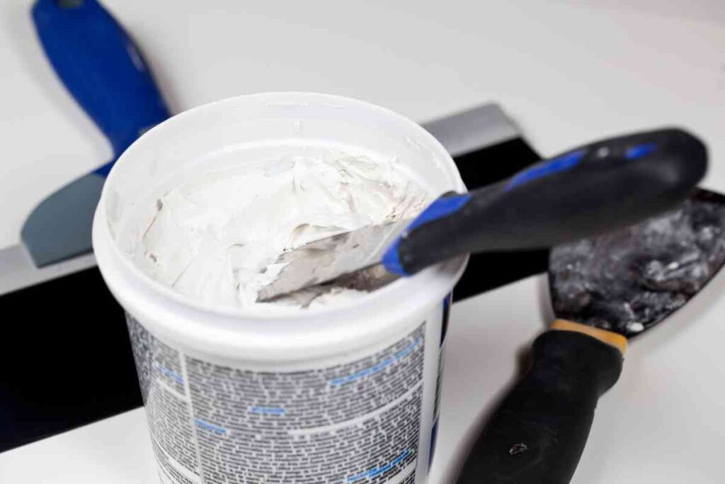 Drywall tools and spackling compound