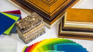 Various colors of paint and veneers to consider when deciding between cabinet refacing vs painting