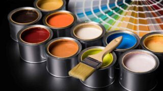 Colorful paints with paint brush and paint samples, valspar vs sherwin williams