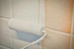 Using a roller for painting over tile